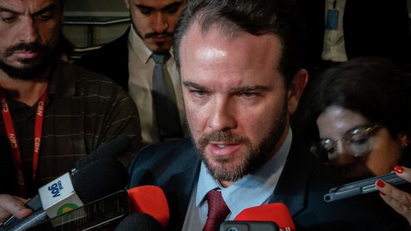 Ministro da Fazenda, Dario Durigan, durante a cerimônia realizada na capital paulista, em 13 de abril de 2026 - Sputnik Brasil