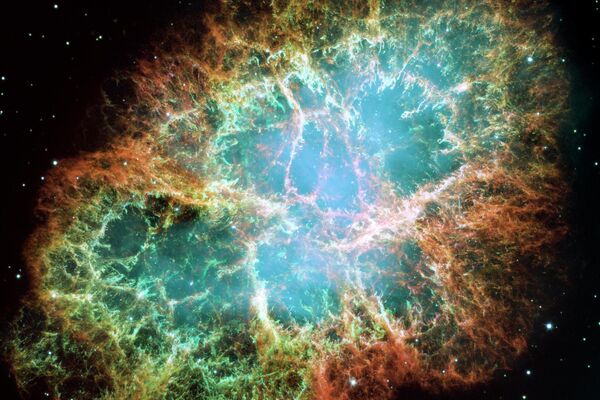 A Nebulosa do Caranguejo é um remanescente de supernova, tudo o que restou de uma tremenda explosão estelar. Observadores na China e no Japão registraram a supernova há quase 1.000 anos, em 1054 - Sputnik Brasil