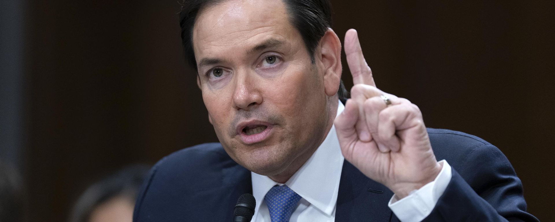 O secretário de Estado dos EUA, Marco Rubio, presta depoimento perante o Comitê de Relações Exteriores do Senado, em audiência para examinar a proposta orçamentária do presidente para o ano fiscal de 2026 para o Departamento de Estado, no Capitólio, Washington, 20 de maio de 2025 - Sputnik Brasil, 1920, 23.06.2026