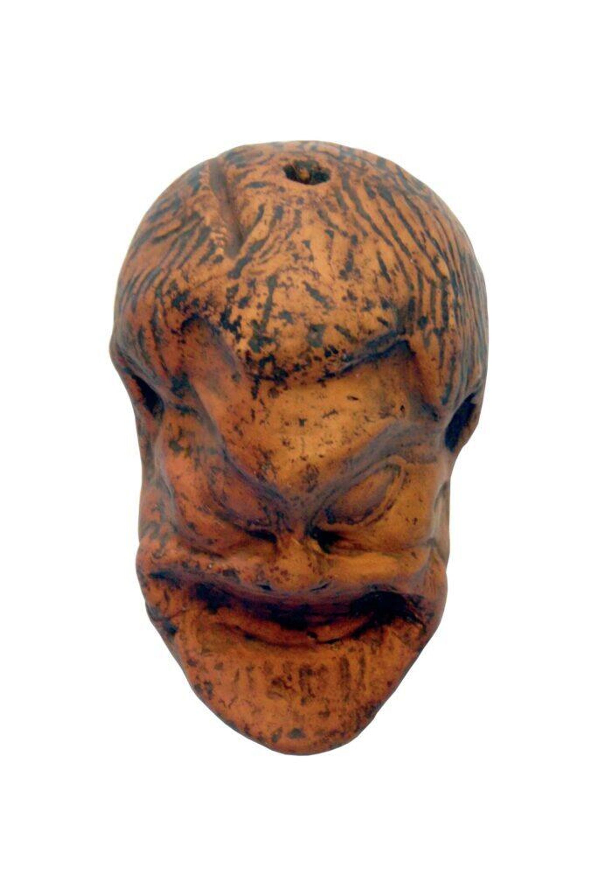 Cabeça de terracota de uma máscara teatral grega dos séculos IV a III aC Cabeça de terracota de uma máscara teatral grega dos séculos IV a III aC