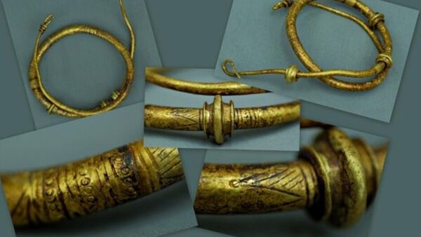 Colares de ouro de 3 mil anos, encontrados na Romênia - Sputnik Brasil