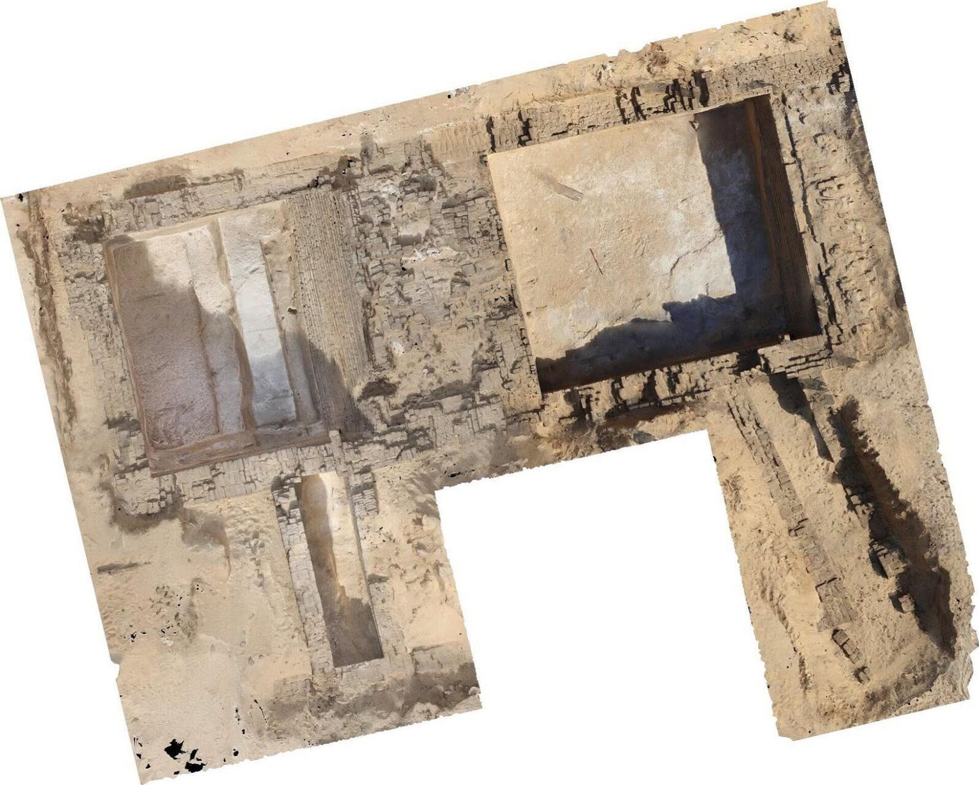 Vista aérea das estruturas funerárias do Período Dinástico Inicial que revelaram evidências de arquitetura funerária que podem refletir ideias de engenharia primitivas posteriormente desenvolvidas na construção de pirâmides do Egito Vista aérea das estruturas funerárias do Período Dinástico Inicial que revelaram evidências de arquitetura funerária que podem refletir ideias de engenharia primitivas posteriormente desenvolvidas na construção de pirâmides do Egito