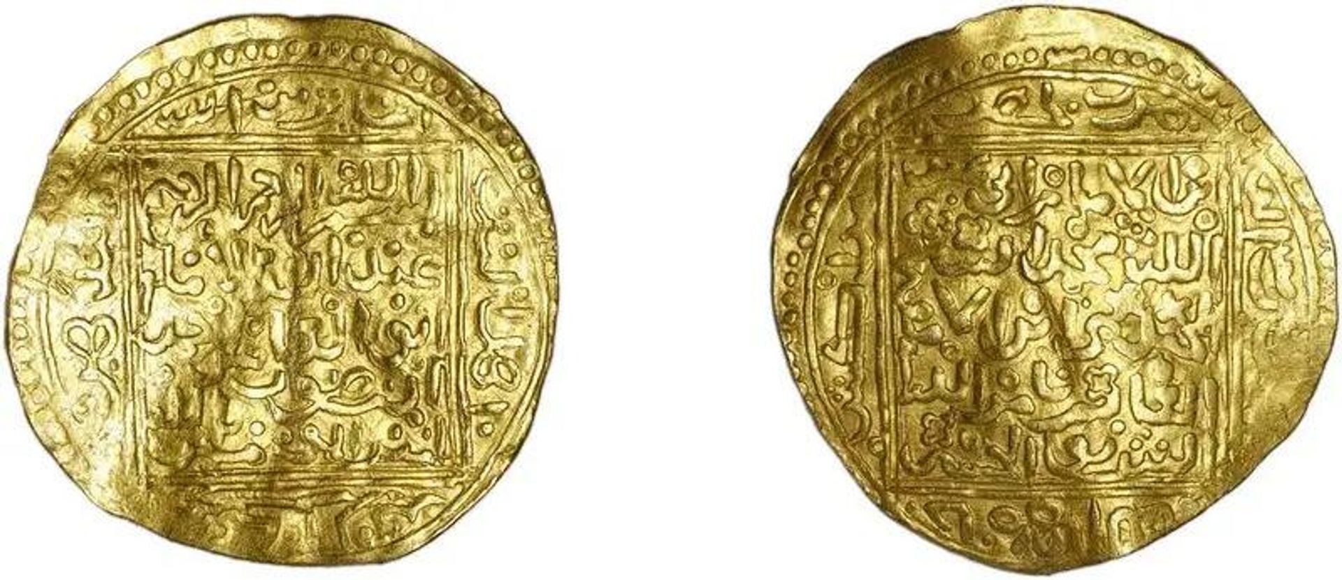 Um dinar de Ahmad al-Mansur, que foi cunhado em Marraquexe. Um dinar de Ahmad al-Mansur, que foi cunhado em Marraquexe.