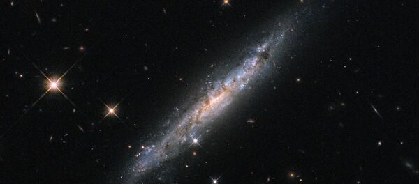Galáxia espiral ESO 580-49, captada através do telescópio espacial Hubble - Sputnik Brasil