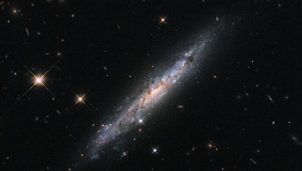 Galáxia espiral ESO 580-49, captada através do telescópio espacial Hubble (imagem de arquivo) - Sputnik Brasil