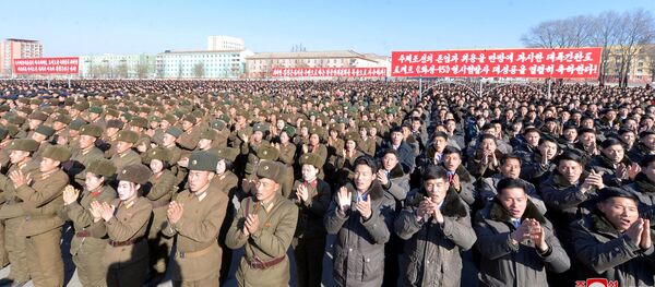 Manifestação celebrando o lançamento do míssil Hwasong-15 - Sputnik Brasil