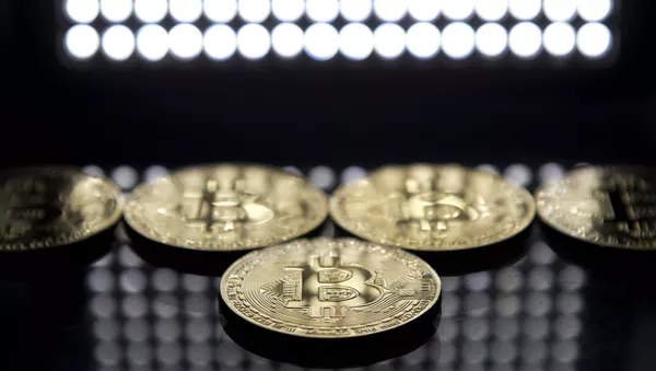 Moedas do bitcoin, Londres - Sputnik Brasil