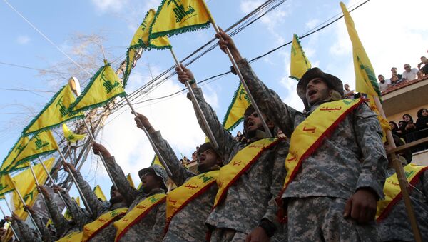 Membros do movimento xiita libanês Hezbollah - Sputnik Brasil