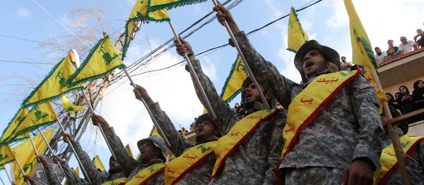 Membros do movimento xiita libanês Hezbollah - Sputnik Brasil