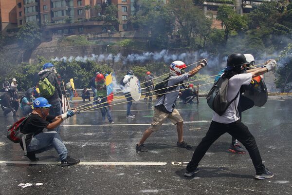 Instabilidade na Venezuela: uma onda de protestos deixou mais de 120 mortos no país governado por Nicolás Maduro. - Sputnik Brasil