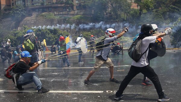 Protestos contra o governo na Venezuela - Sputnik Brasil
