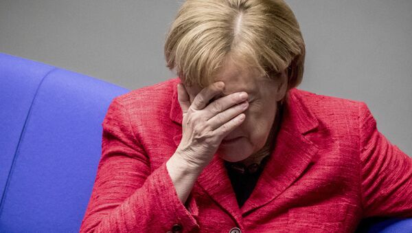 German Chancellor Angela Merkel attends a plenary session of German parliament Bundestag in Berlin, Tuesday, Nov. 21, 2017 - Sputnik Brasil