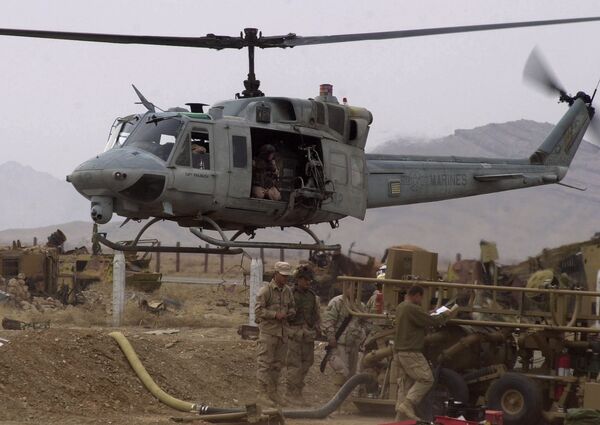 Helicóptero militar dos EUA AH1-Huey no aeroporto de Kandahar, Afeganistão (foto de arquivo) - Sputnik Brasil