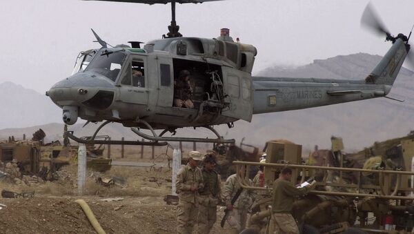 Helicóptero militar dos EUA AH1-Huey no aeroporto de Kandahar, Afeganistão (foto de arquivo) - Sputnik Brasil