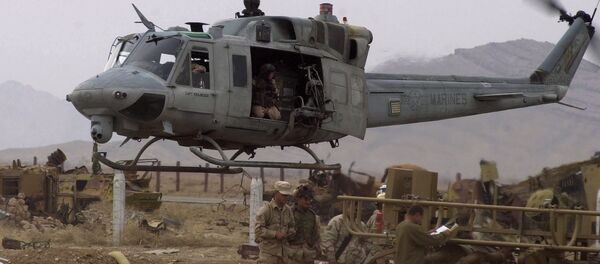 Helicóptero militar dos EUA AH1-Huey no aeroporto de Candaar, Afeganistão (foto de arquivo) - Sputnik Brasil