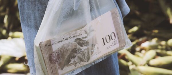 Bolívares venezuelanos - Sputnik Brasil