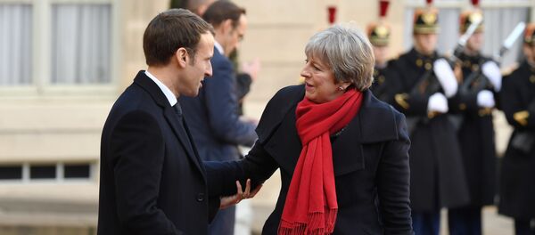 Emmanuel Macron et Theresa May. Photo d'archive - Sputnik Brasil