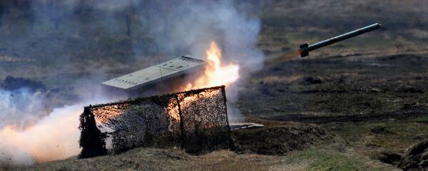 Sistema múltiplo de foguetes pesado TOS-1 Buratino durante exercícios na região de Primorie - Sputnik Brasil