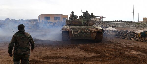 Forças governamentais sírias durante a ofensiva no sul da província de Aleppo para retomar o controle sobre o aeródromo de Abu al-Duhur, 18 de janeiro de 2018 - Sputnik Brasil