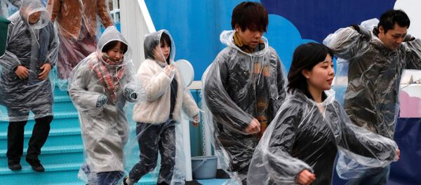 Exercícios simulando evacuação antimíssil em Tóquio, Japão, 22 de janeiro de 2018 - Sputnik Brasil