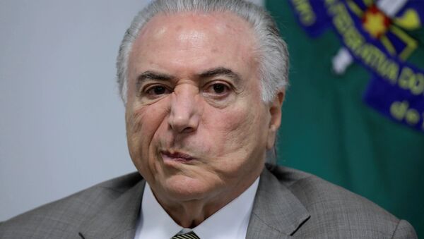 Michel Temer reage a uma réplica durante um encontro sobre a modernização do metrô de Brasília, em 22 de janeiro de 2018 - Sputnik Brasil