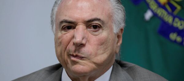 Michel Temer reage a uma réplica durante um encontro sobre a modernização do metrô de Brasília, em 22 de janeiro de 2018 - Sputnik Brasil