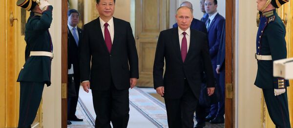 July 4, 2017. From right: Russian President Vladimir Putin meets with People's Republic of China President Xi Jinping in Moscow. July 4, 2017. From right: Russian President Vladimir Putin meets with People's Republic of China President Xi Jinping in Moscow. - Sputnik Brasil