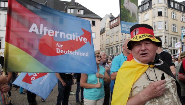 AfD-Anhänger protestieren gegen Angela Merkels Wahlzug in Annaberg-Buchholz - Sputnik Brasil