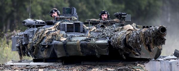 Soldados da OTAN no tanque alemão Leopard 2 participam dos exercícios da Aliança, Lituânia (foto de arquivo) - Sputnik Brasil