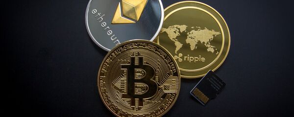 Criptomoedas (imagem referencial) Criptomoedas (imagem referencial) - Sputnik Brasil