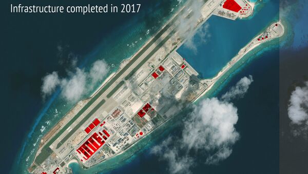 Imagem de satélite mostrando o recife de Fiery Cross no arquipélago Spartly no mar do Sul da China, onde Pequim teria construído instalações em 2017, segundo o Centro de Estudos Estratégicos e Internacionais (CSIS) - Sputnik Brasil