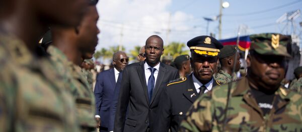 Presidente do Haiti, Jovenel Moise, em desfile com as Forças Armadas do Haiti. Presidente do Haiti, Jovenel Moise, em desfile com as Forças Armadas do Haiti. - Sputnik Brasil