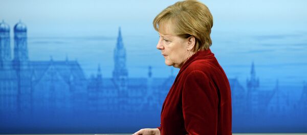 German Chancellor Angela Merkel enters the podium to deliver a speech during the 51st Munich Security Conference (MSC) in Munich German Chancellor Angela Merkel enters the podium to deliver a speech during the 51st Munich Security Conference (MSC) in Munich - Sputnik Brasil