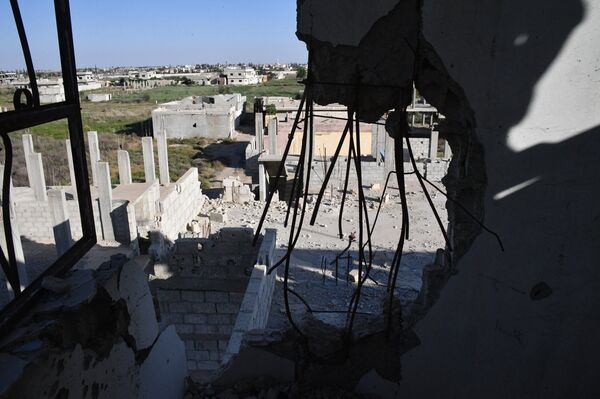 Edifícios destruídos no decurso de operações militares em Ghouta Oriental, nos subúrbios de Damasco. - Sputnik Brasil