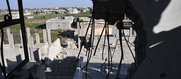 Edifícios destruídos no decurso de operações militares em Ghouta Oriental, nos subúrbios de Damasco. - Sputnik Brasil