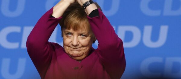 Chanceler alemã, Angela Merkel, durante o discurso no congresso do partido União Democrata-Cristã em Berlim Chanceler alemã, Angela Merkel, durante o discurso no congresso do partido União Democrata-Cristã em Berlim - Sputnik Brasil