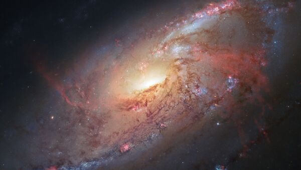 Imagem feita pelo telescópio Hubble mostrando a galáxia M106 (imagem de aquivo) - Sputnik Brasil