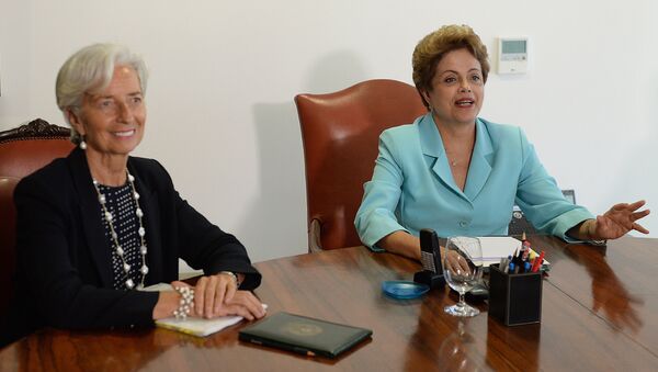 Christine Lagarde e Dilma Rousseff durante encontro no Palácio do Planalto, em Brasília, nesta quinta-feira (21) - Sputnik Brasil