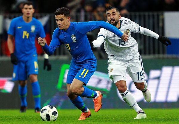 Philippe Coutinho e Aleksandr Samedov durante o amistoso entre o Brasil e a Rússia, em 23 de março Philippe Coutinho e Aleksandr Samedov durante o amistoso entre o Brasil e a Rússia, em 23 de março - Sputnik Brasil