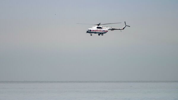 Helicóptero participa de operação de resgate (foto de arquivo) - Sputnik Brasil