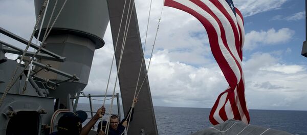 Bandeira dos EUA perto dos territórios disputados Bandeira dos EUA perto dos territórios disputados - Sputnik Brasil