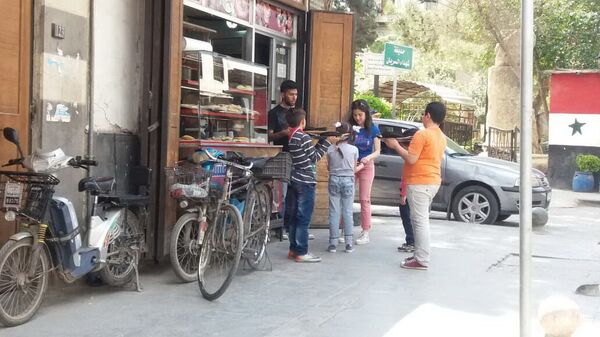 Vida da cidade síria de Damasco após os ataques aéreos da coalizão internacional em 14 de abril de 2018 - Sputnik Brasil