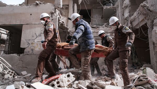 Membros da defesa civil síria, mais conhecidos como Capacetes Brancos em Damasco (foto de arquivo) - Sputnik Brasil