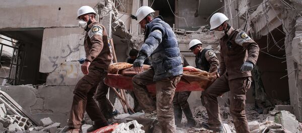 Membros da defesa civil síria, mais conhecidos como Capacetes Brancos em Damasco (foto de arquivo) - Sputnik Brasil