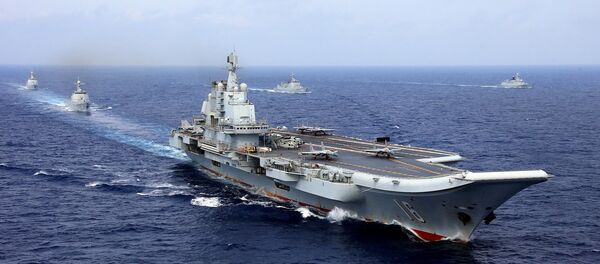 Porta-aviões Liaoning participando de manobras da Marinha do Exército Popular de Libertação da China, 18 de abril de 2018 - Sputnik Brasil