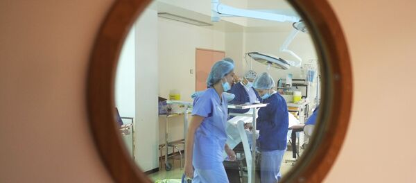 Médicos fazem operação oncológica (imagêm referencial) - Sputnik Brasil