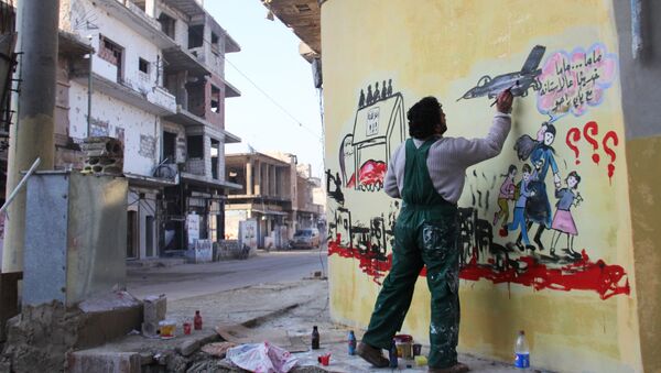 Syrian artist Aziz al-Asmar works on a mural depicting the war in his country ahead of the start of the Astana peace talks, on January 19, 2017, in the Syrian rebel-held town of Binnish, on the outskirts of Idlib - Sputnik Brasil