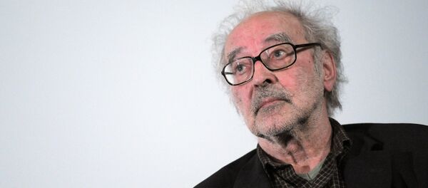 In this file photo taken on June 19, 2010 Swiss film director Jean-Luc Godard attends a debate when presenting his last movie 'Film socialiste' (Socialist movie) at the Cinema des cineastes in Paris In this file photo taken on June 19, 2010 Swiss film director Jean-Luc Godard attends a debate when presenting his last movie 'Film socialiste' (Socialist movie) at the Cinema des cineastes in Paris - Sputnik Brasil