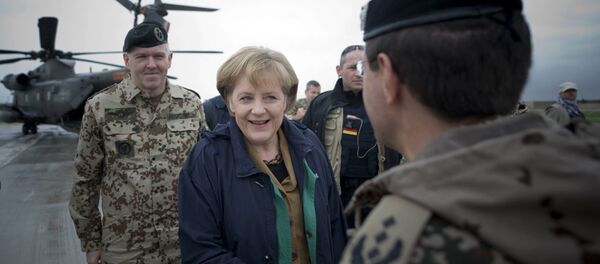 Angela Merkel bei Besuch der Bundeswehr-Truppen in Afghanistan (Archivbild) - Sputnik Brasil