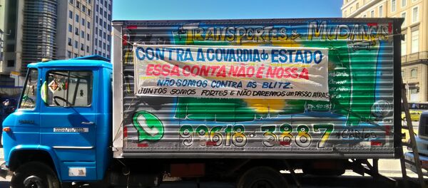 Manifestação de caminhoneiros no Rio de Janeiro como parte de mobilização nacional da categoria contra os preços altos dos combustíveis no Brasil. - Sputnik Brasil